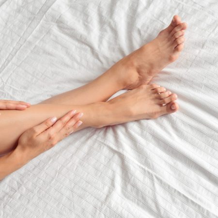 perfect and beautiful woman legs on bed perfect and beautiful woman legs on bed